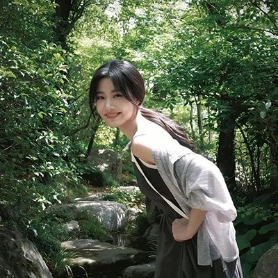陳**